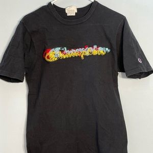 Black Champion shirt with embroidered brand on front